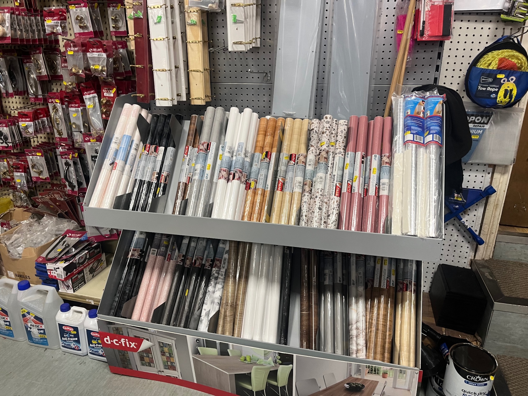 County DIY vinyl and sticky back plastic rolls displayed in store